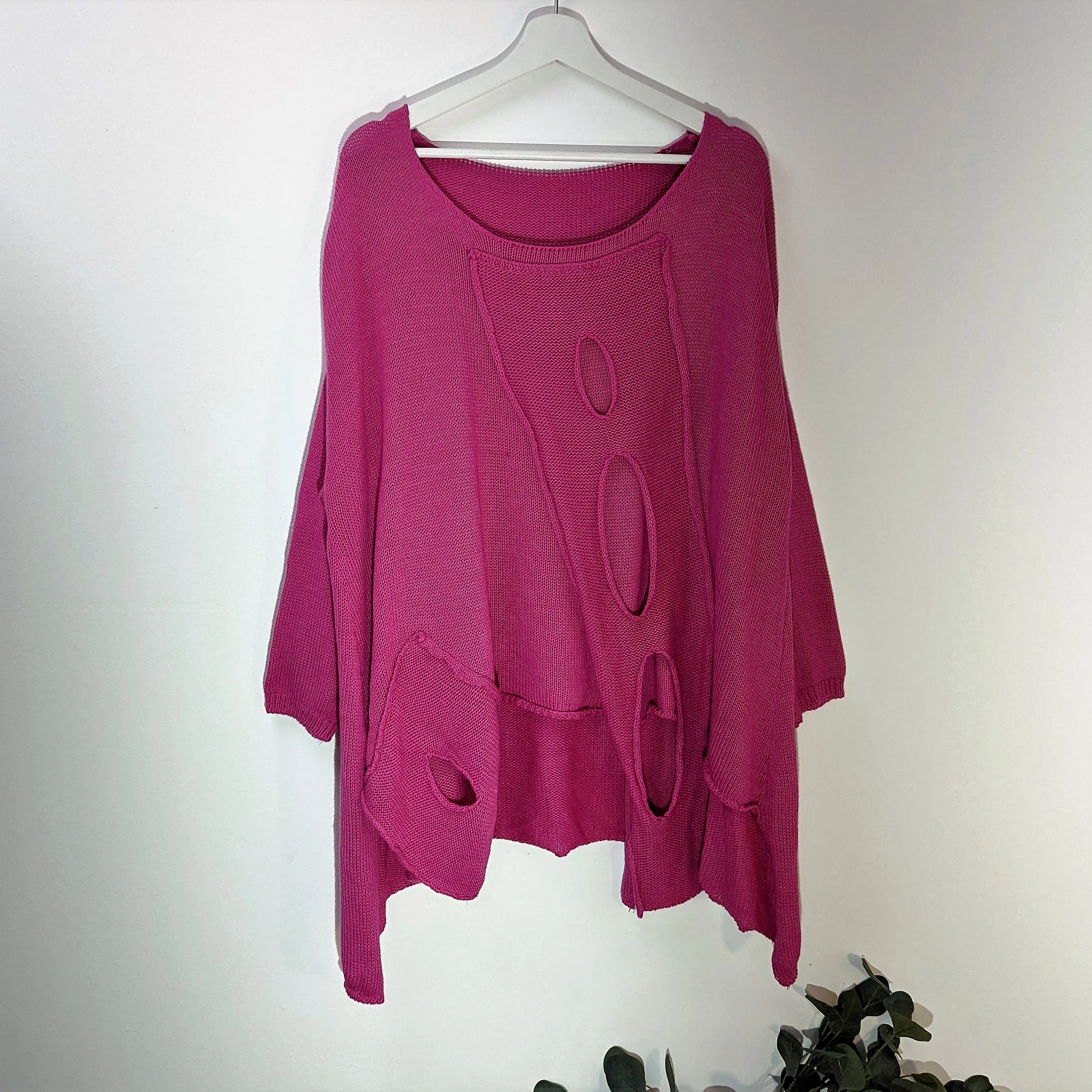 Fashionable holey cotton jumper with side pocket detail